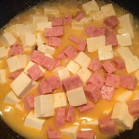 桃子的：蟹黄豆腐的做法 步骤7